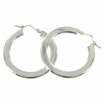 Boucles d'oreilles cr�oles Or blanc.